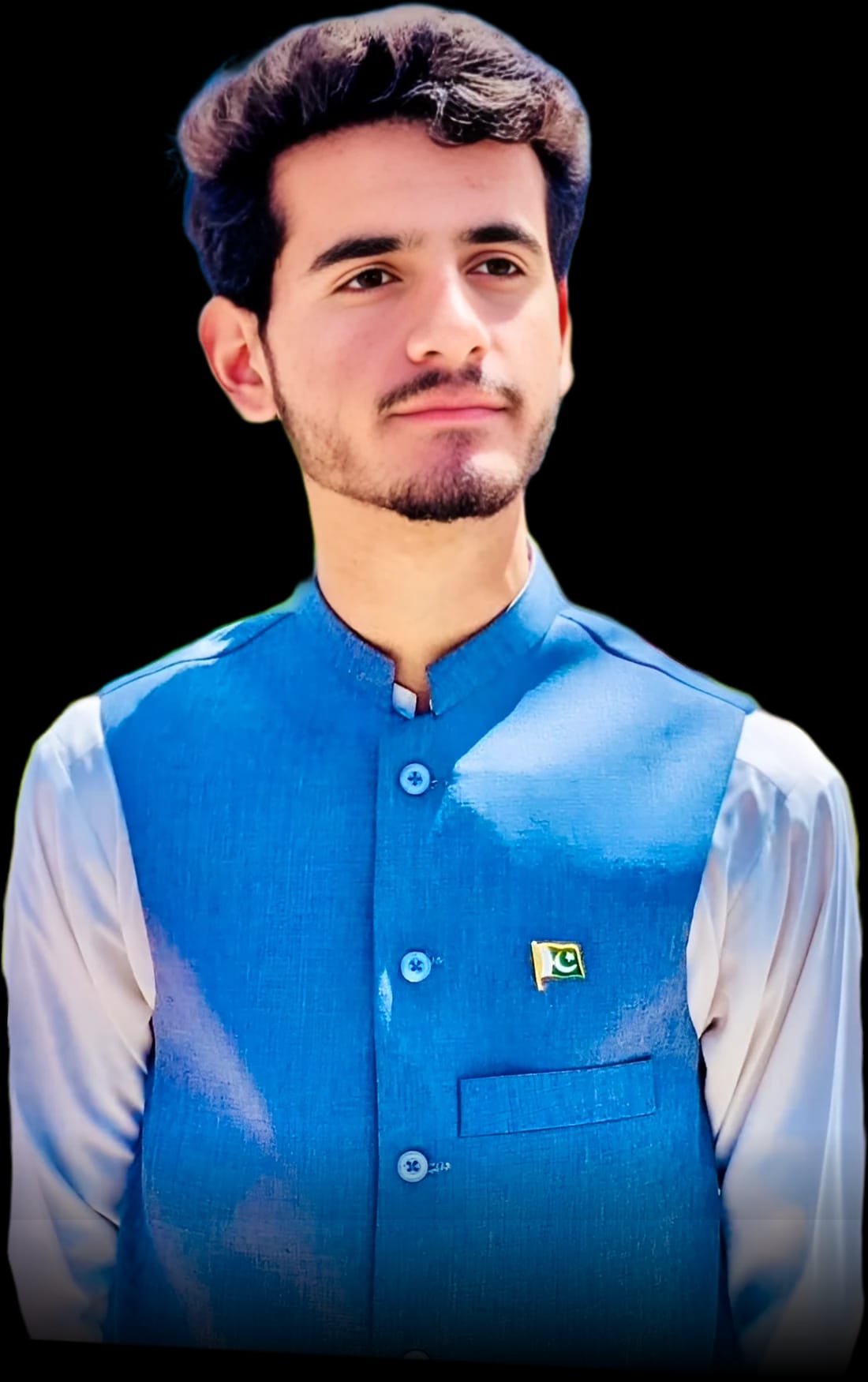 Kashif Rehman in a blue waistcoat with a Pakistan flag pin