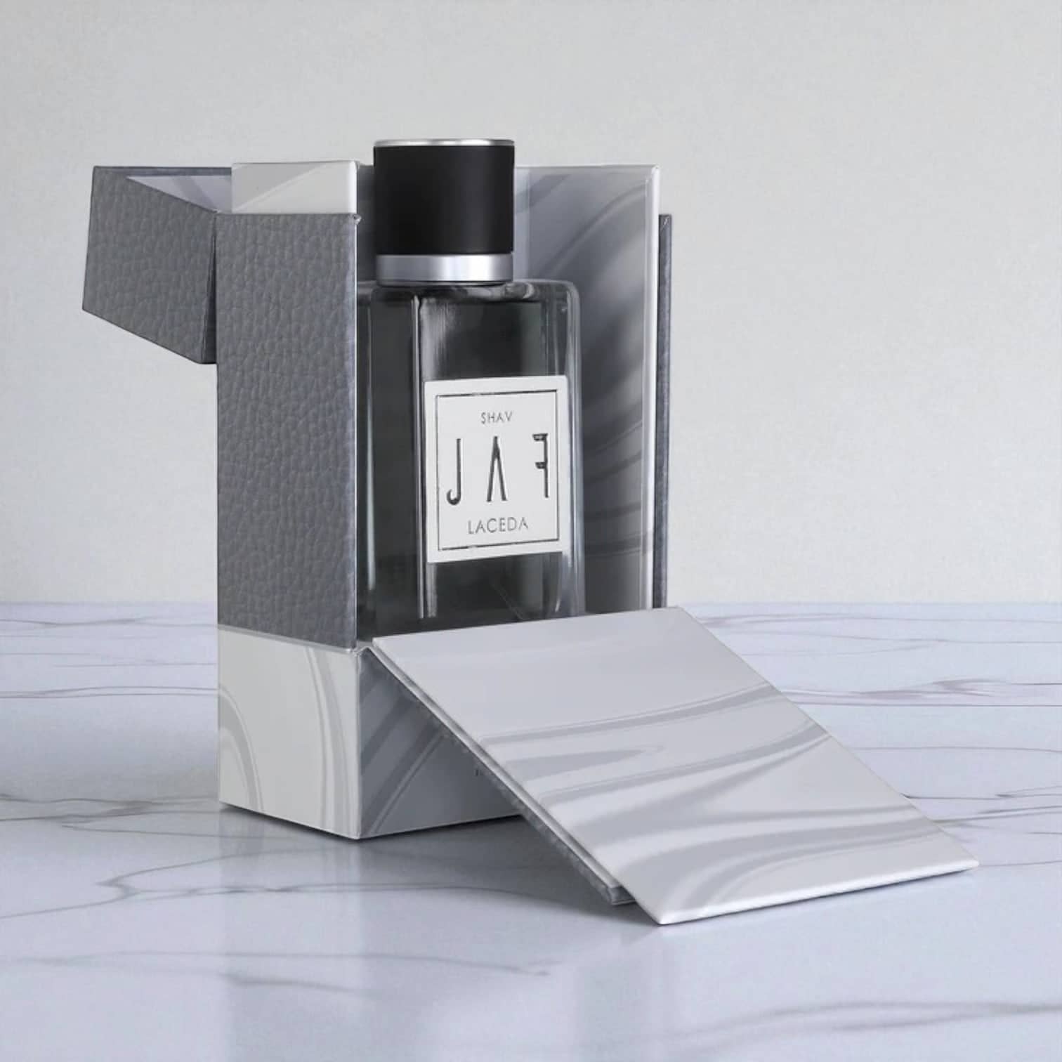 PackSmart grey textured luxury perfume box with an open lid and a silver liner, showing the rectangular perfume bottle inside.
