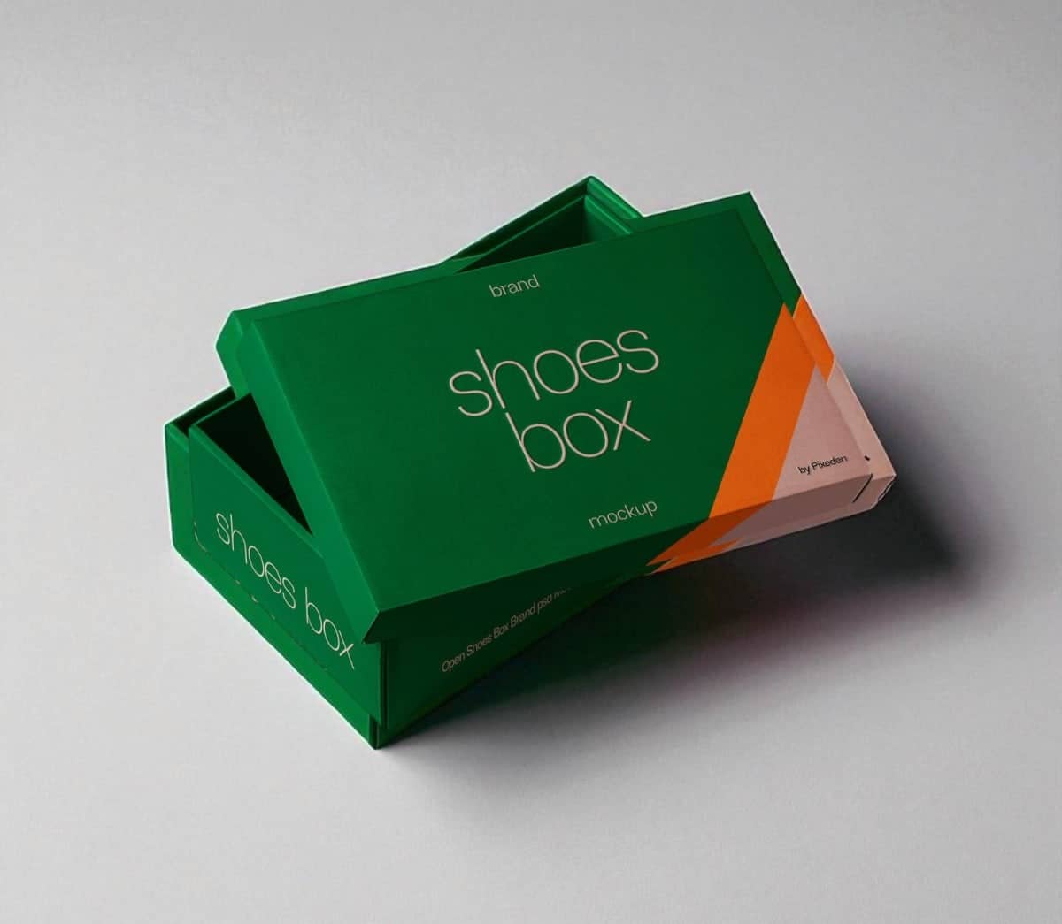 PackSmart green shoe box with an orange side panel, lid lifted.